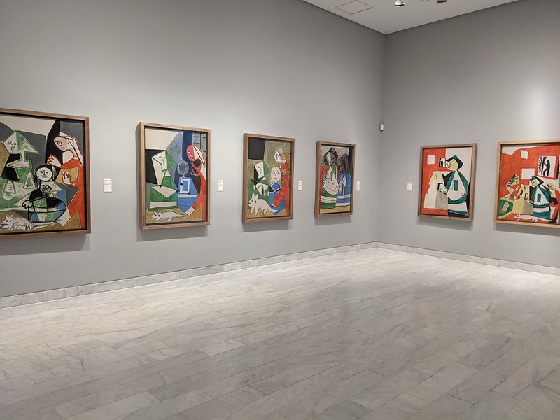 Six paintings hanging on the wall of the Picasso museums