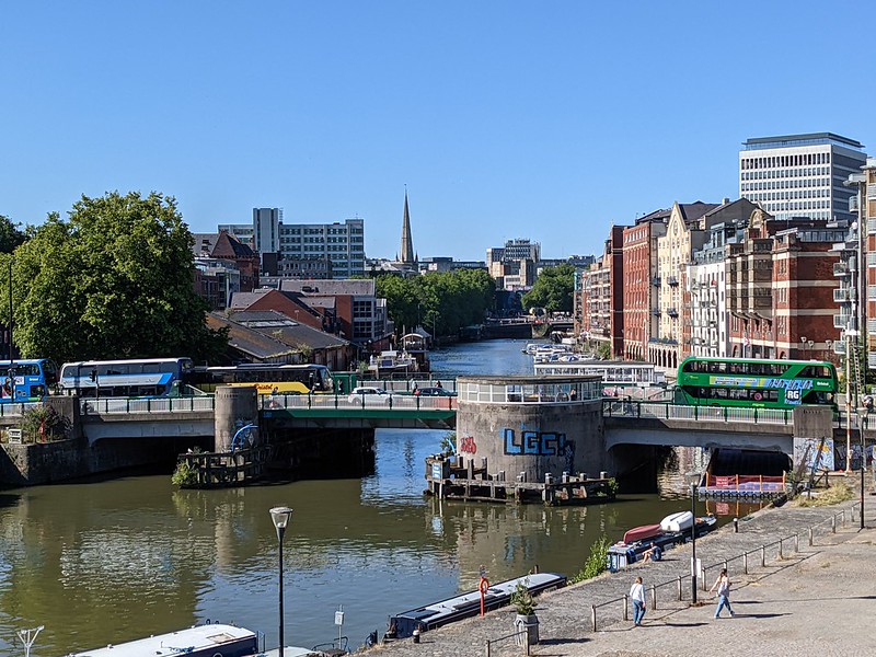 Bridge over the river Avon with water front area in the foreground.