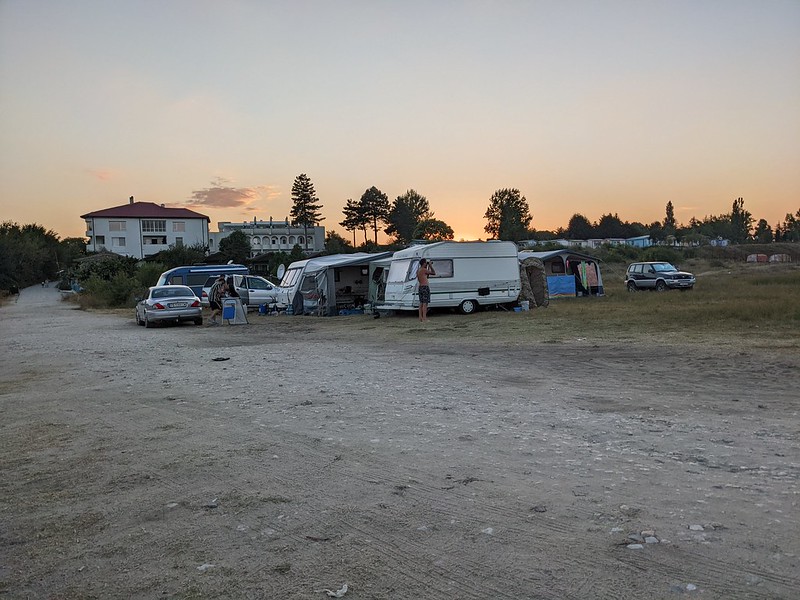 Old caravans with tents attached to them.