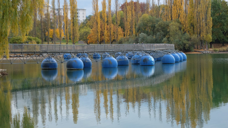 Pontoon bridge over a lake in the autumn